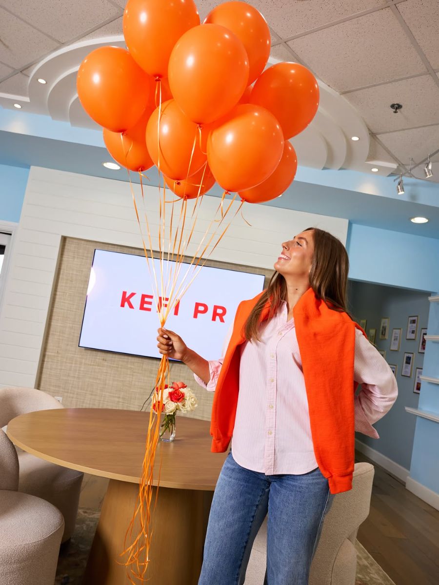 Orange balloons outside the new KEFI office